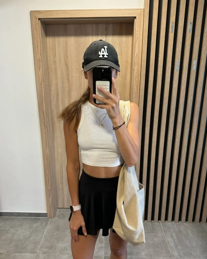 August Outfits 2026 White Crop Tank With Black Skort for Athletic Ease