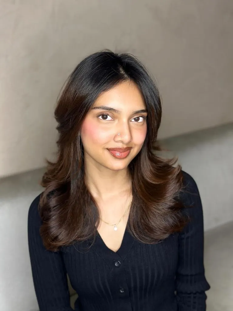 Fall Haircuts for Women 2026 Warm Brunette Butterfly Layers With A Center Part