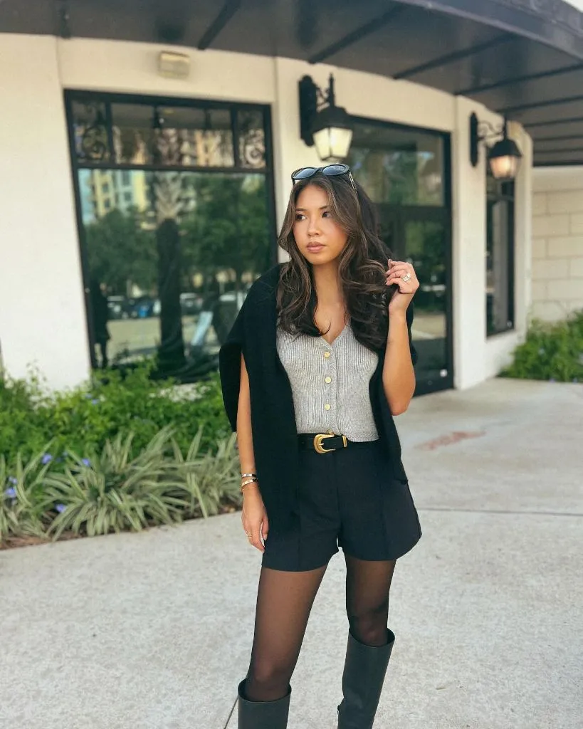 Early Fall Outfits 2026 Grey Ribbed Cardigan With Black Shorts and Riding Boots