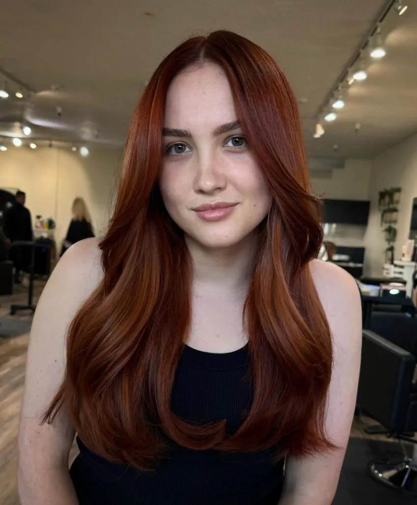 Fall Hairstyles 2026 Vibrant Copper Red with Long Waves for a Bold Autumn Statement