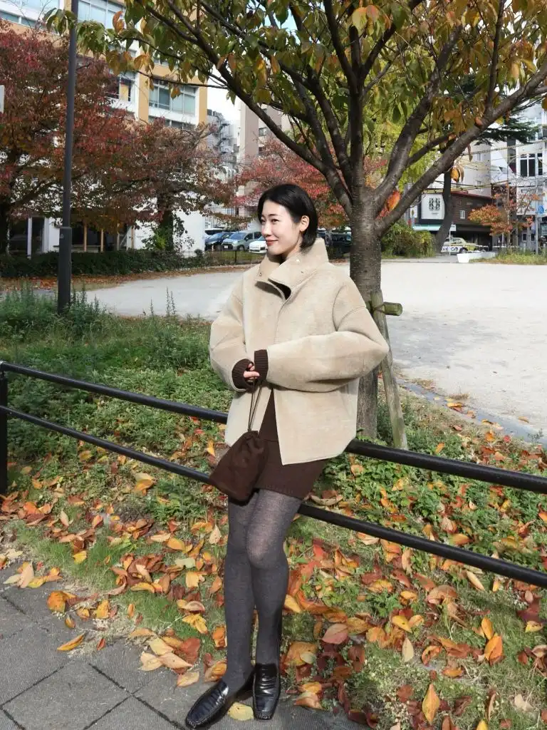 Knit Skirt Outfits Fall 2026 Brown Knit Mini With a Beige Cocoon Jacket for Autumn Softness