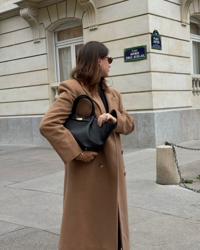 Fall Professional Outfits Women 2026 Camel Maxi Coat With Black Trousers And Top-Handle Bag