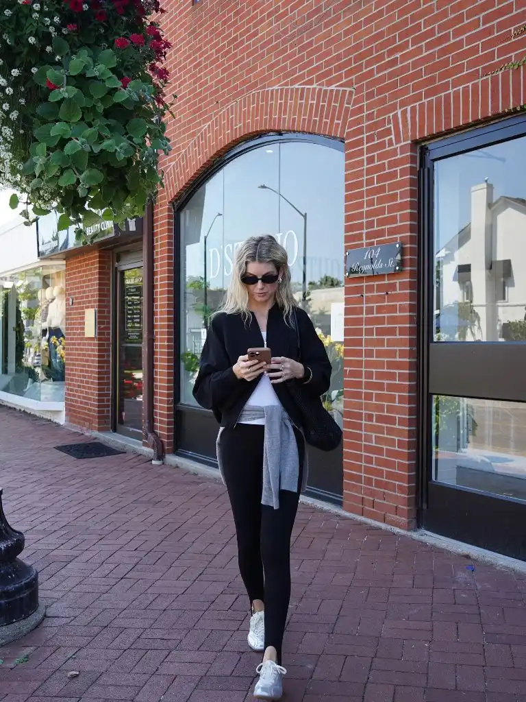 Nice Fall Outfits 2026 Black Bomber and Leggings With White Sneakers for Errand Runs