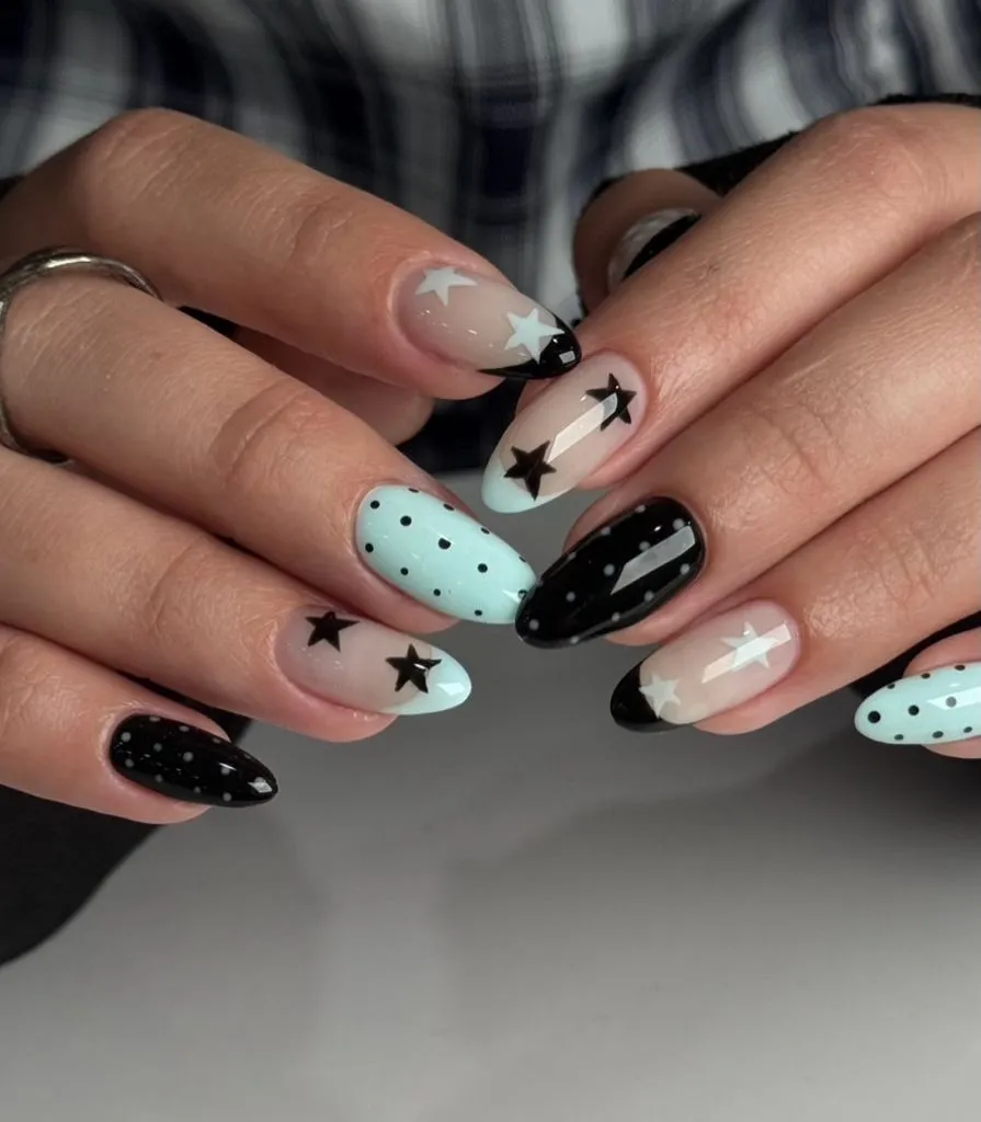 August Nails Ideas 2026 Mint and Black Star-Print Nails for a Retro-Playful Vibe