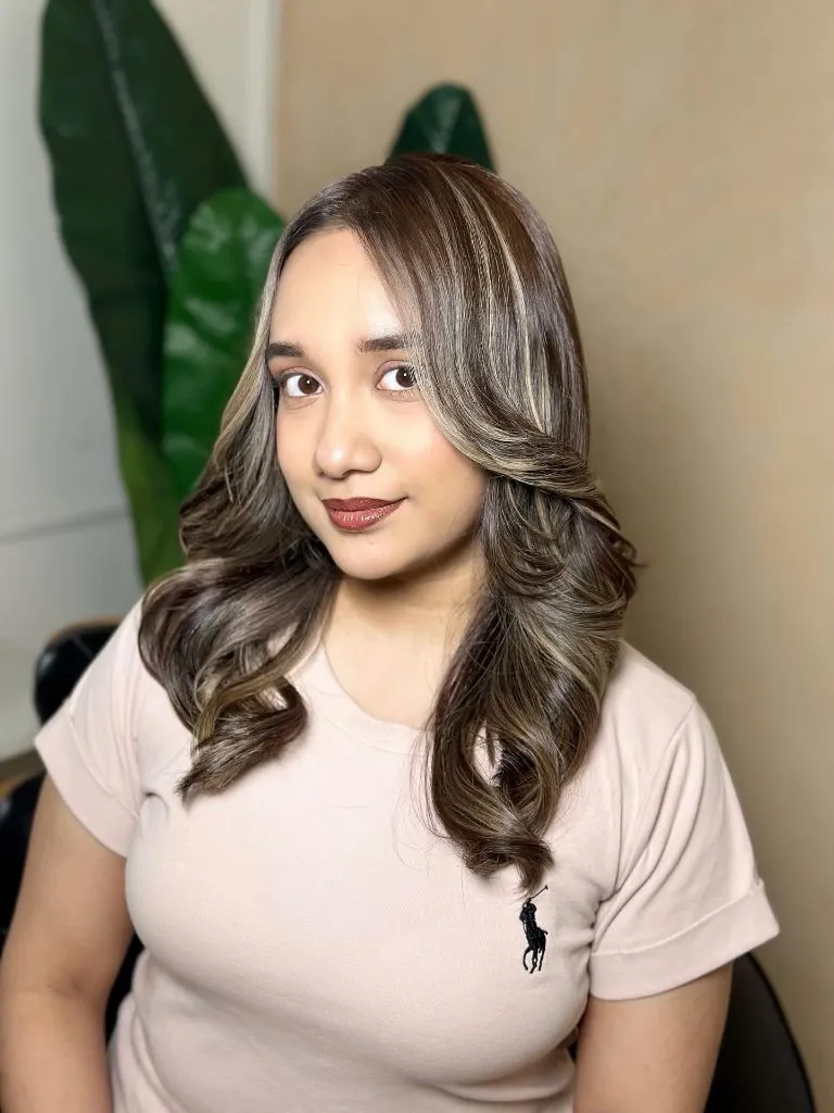 Fall Haircuts for Women 2026 Warm Caramel-Kissed Highlights With Barrel-Curled Bounce