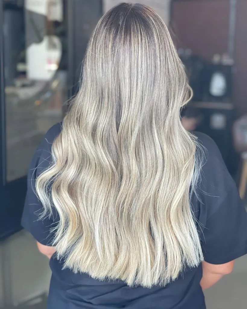August Hairstyles And Color Ideas 2026 Icy Ash Blonde Balayage With A Shadowed Root