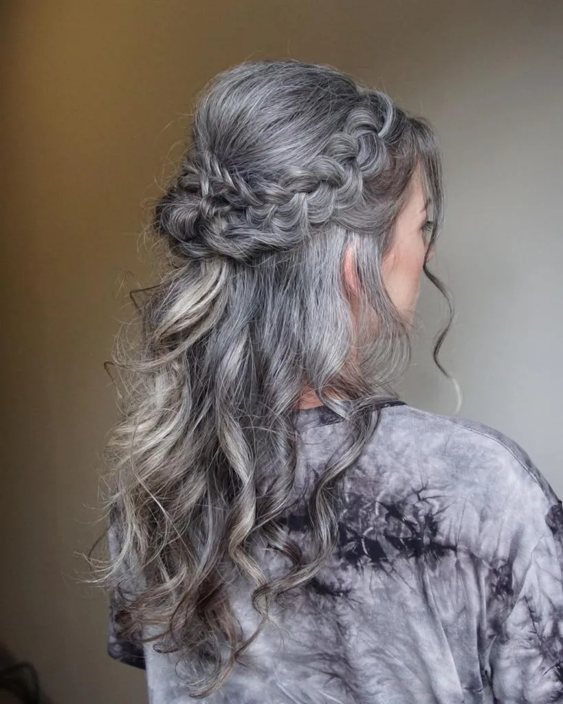 Fall Hairstyles for Wedding Guests 2026 Silver Braided Half-Up with Cascading Autumn Waves