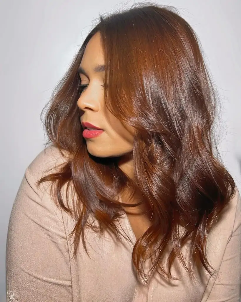 Fall Brunette Hair Colour 2026 Burnished Auburn Brunette with Tousled Medium Waves