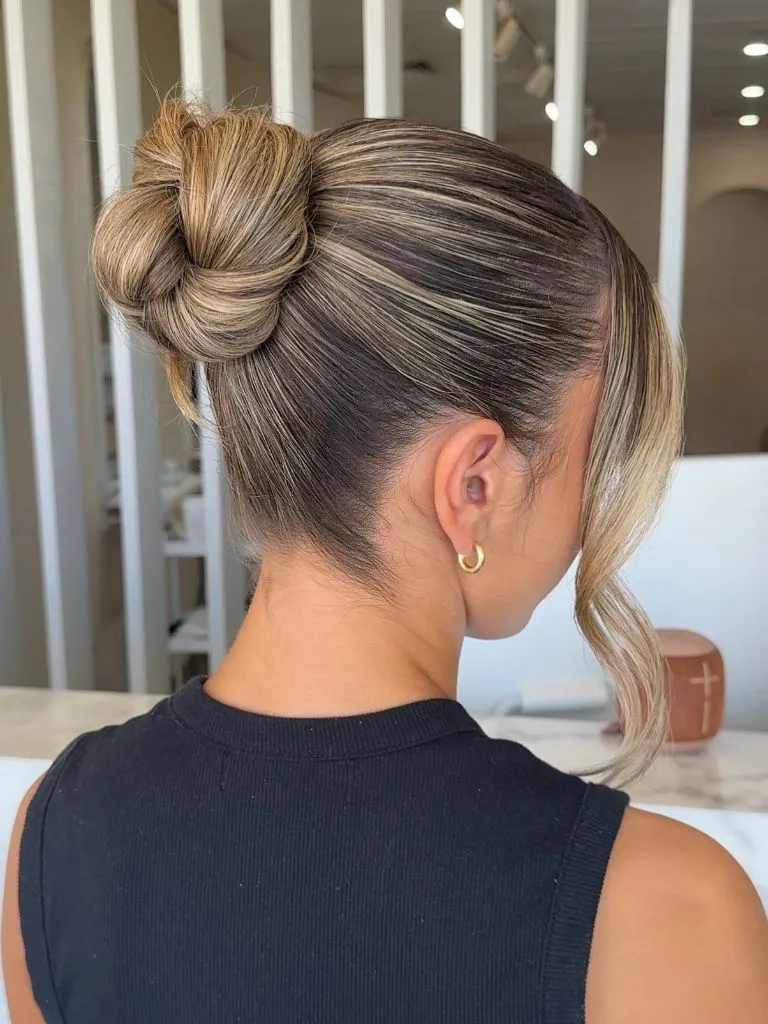Fall Hairstyles for Office 2026 Polished High Bun with Highlighted Dimension and Clean Lines