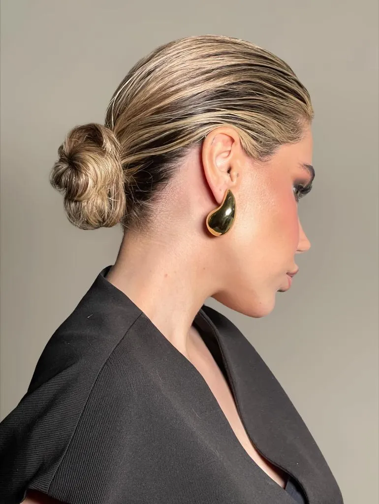 Fall Hairstyles for Office 2026 Sleek Low Knot Bun with Polished Minimalist Finish
