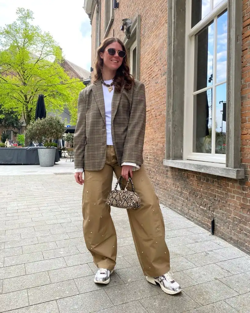 Wide Leg Jeans Outfit Fall 2026 Plaid Blazer With Tan Parachute Pants and Snake Print Bag