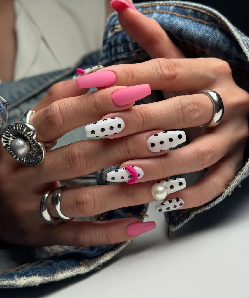 August Nails Ideas 2026 Pink and Polka-Dot Coffin Nails With Pearl Accent for a Fun Statement