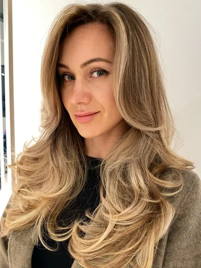 Fall Haircuts for Women 2026 Dimensional Cashmere Blonde Layers With A Lived-In Blowout