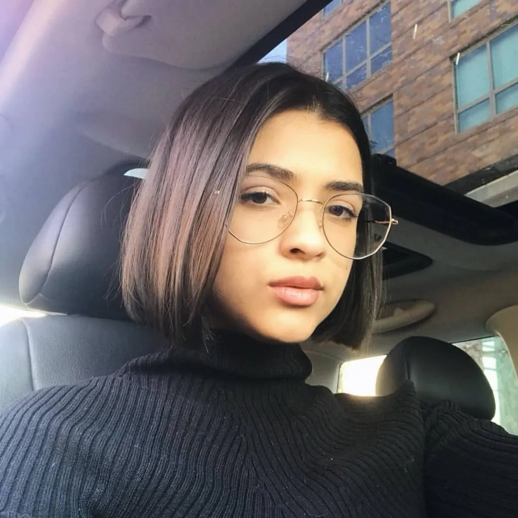 Bobbed Haircut for Women 2026 Sleek Chin-Length Bob with Soft Mauve Undertones