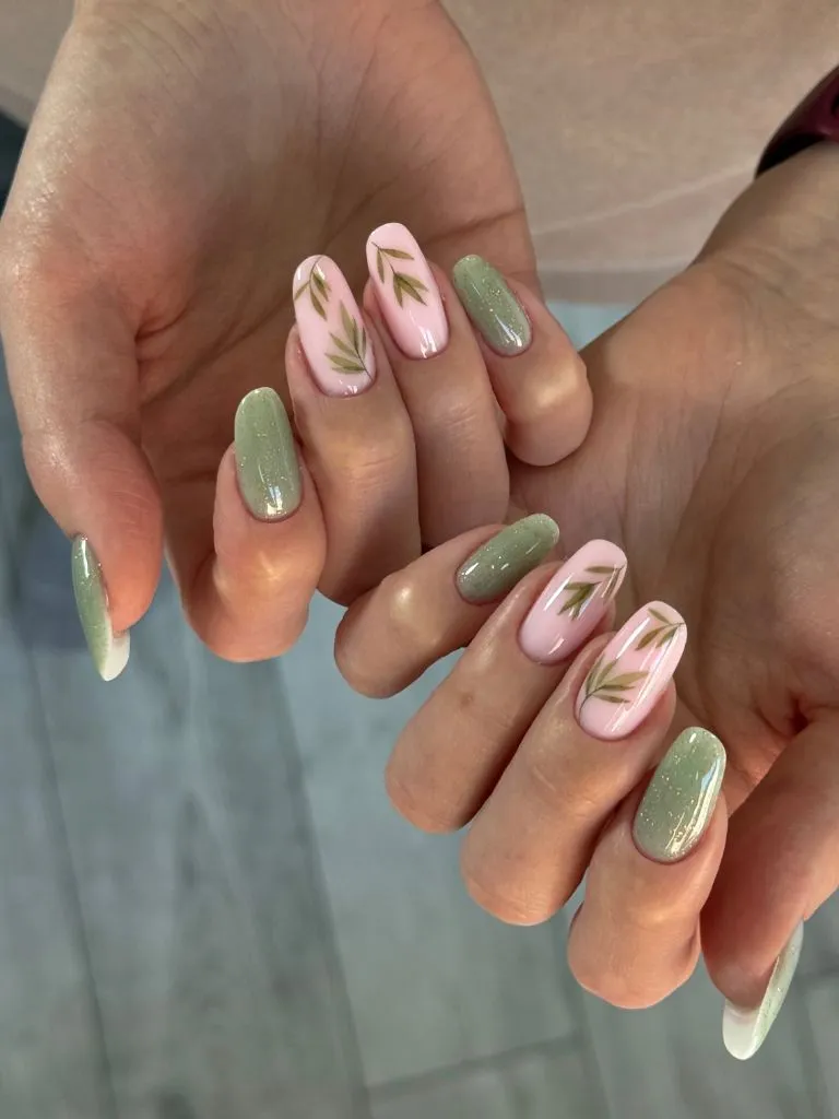 Fall Medium Nail Ideas 2026 Sage Green and Blush Pink Almond Nails With Hand-Painted Leaf Art