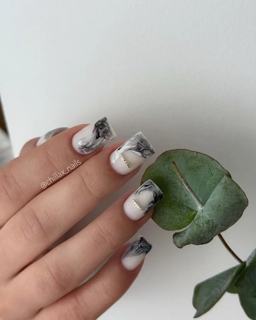 Fall Medium Nail Ideas 2026 White and Grey Marble Square Nails With Gold Crystal Divider