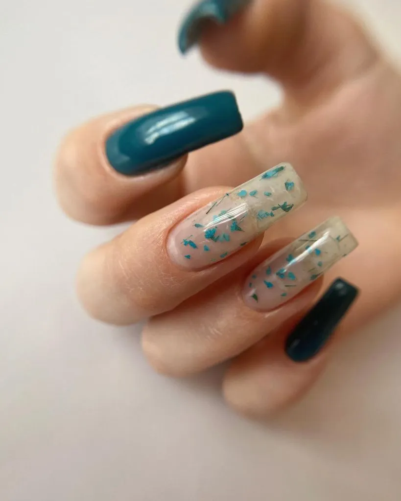 Fall Almond Nails 2026 Teal Solid and Floral Encapsulated Square Nails With Dried Flower Detail