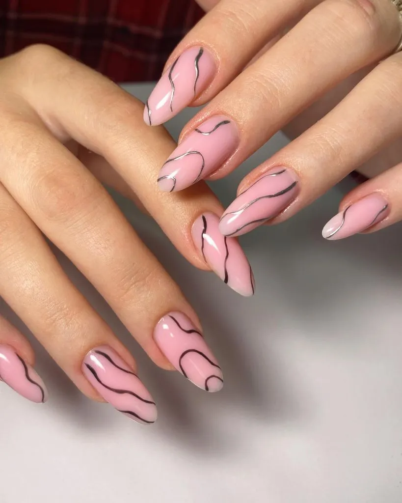 Fall Almond Nails 2026 Pink Almond Nails With Thin Black Freehand Swirl Lines