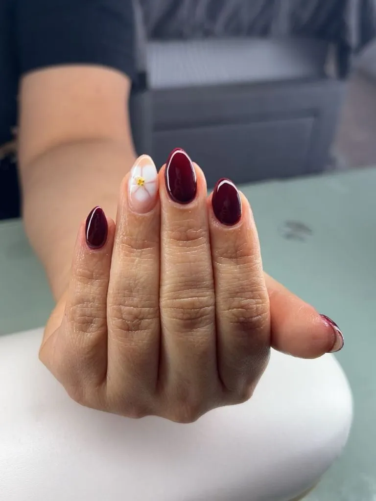 Simple Fall Short Nails Burgundy Almond Nails with Floral Accent for Fall