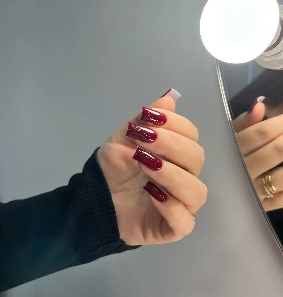 Fall Medium Nail Ideas 2026 Deep Burgundy Glossy Coffin Nails With Clean Monochrome Finish