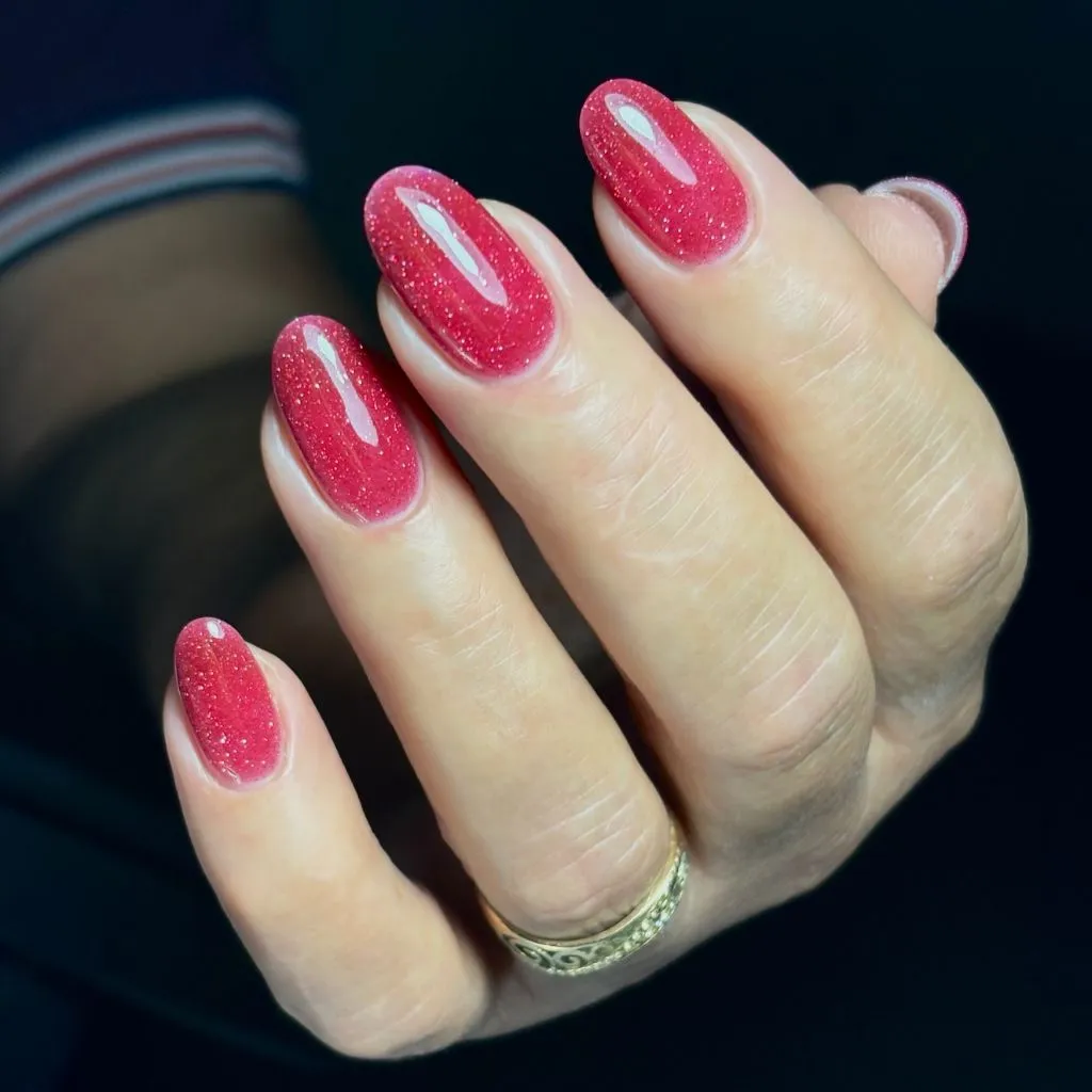 Fall Medium Nail Ideas 2026 Coral Pink Shimmer Almond Nails With Fine Glitter Finish