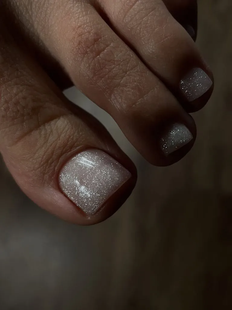 Fall Pedicure Ideas 2026 Sheer White Shimmer Pedicure on Short Square Toenails