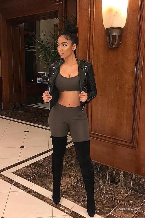 Leather jacket leggings and knee-high boots night club outfit