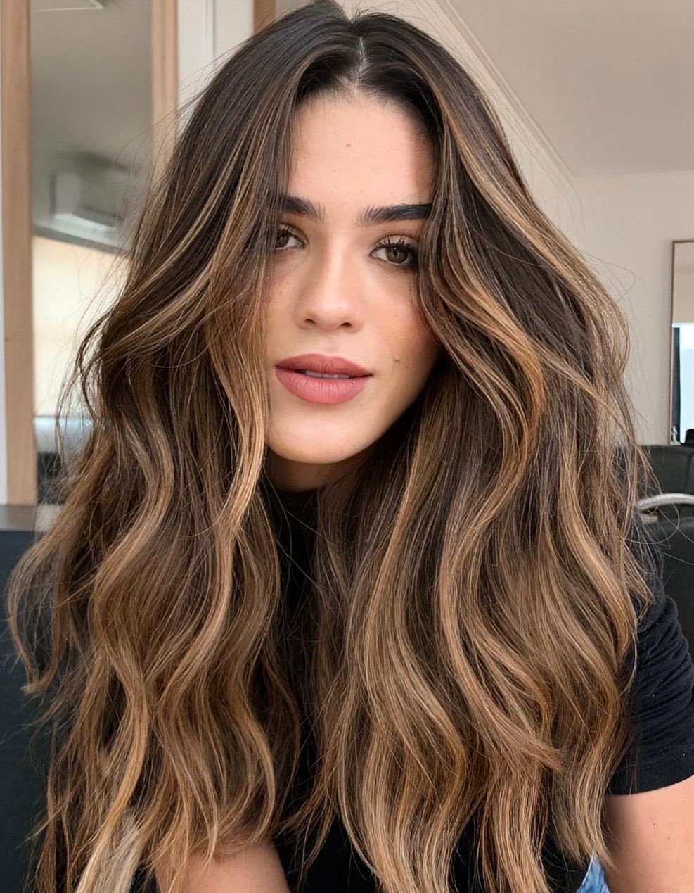 Dimensional caramel weave on dark brown hair