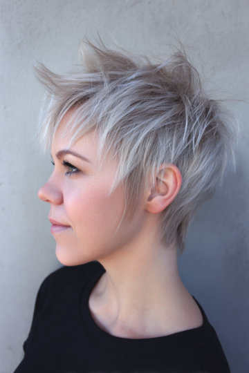 Silver blonde pixie cut with wet glossy finish