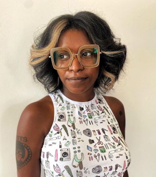 Flicked layers with block highlights curly layered haircut