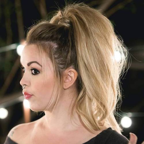 Face-framing ponytail with a hair wrap and soft volume