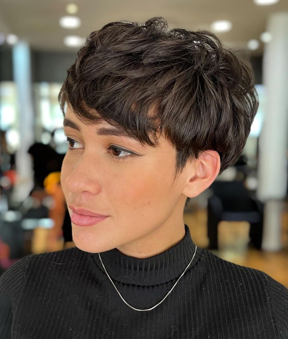 Pixie cut with disconnected layers on thick brown hair