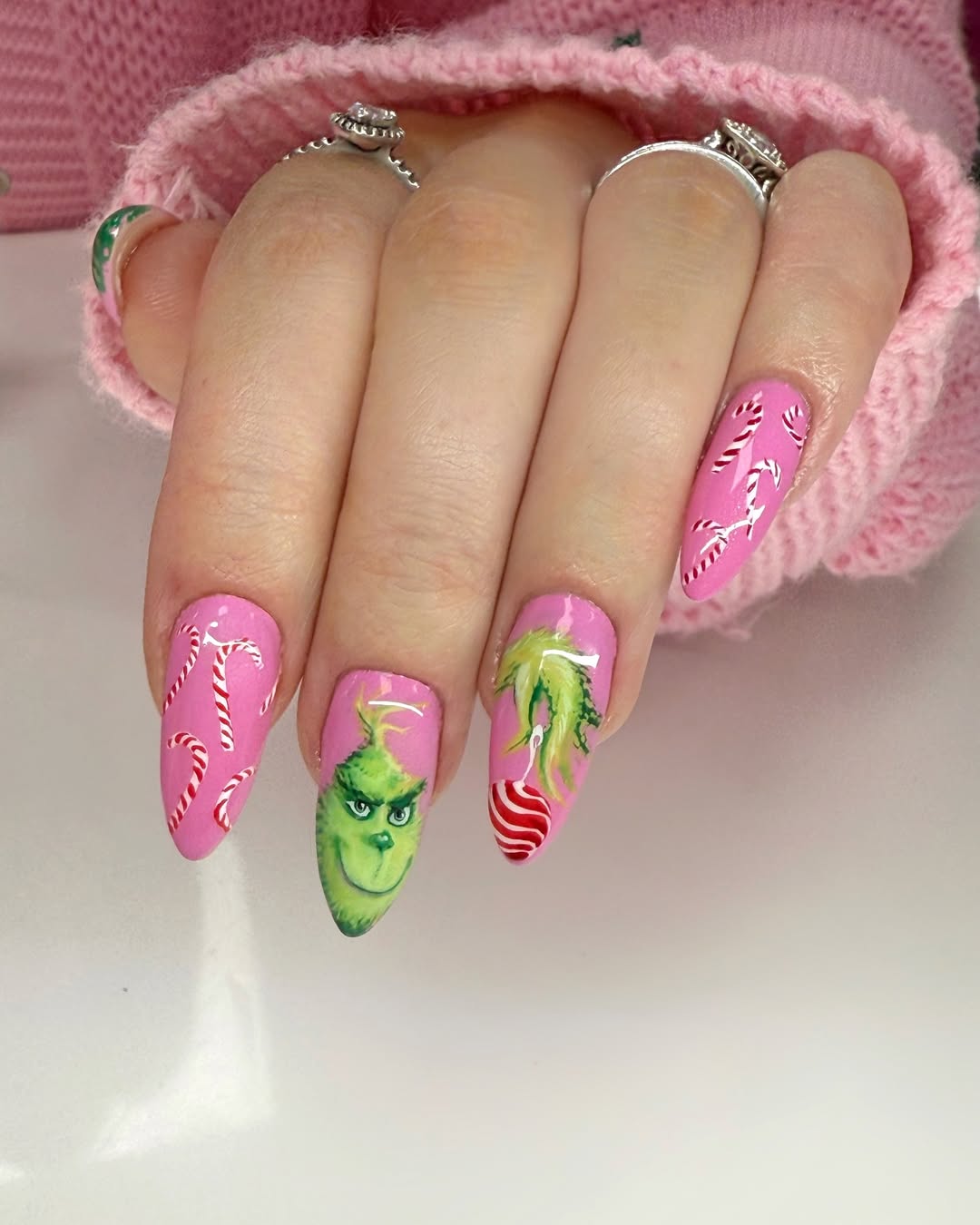 Pink Grinchmas Candy Cane Nails grinch nail design