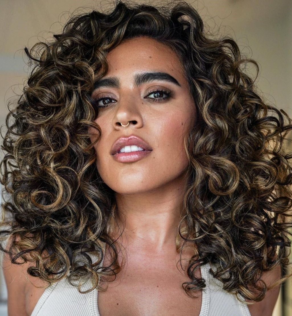 Caramel balayage on natural curls