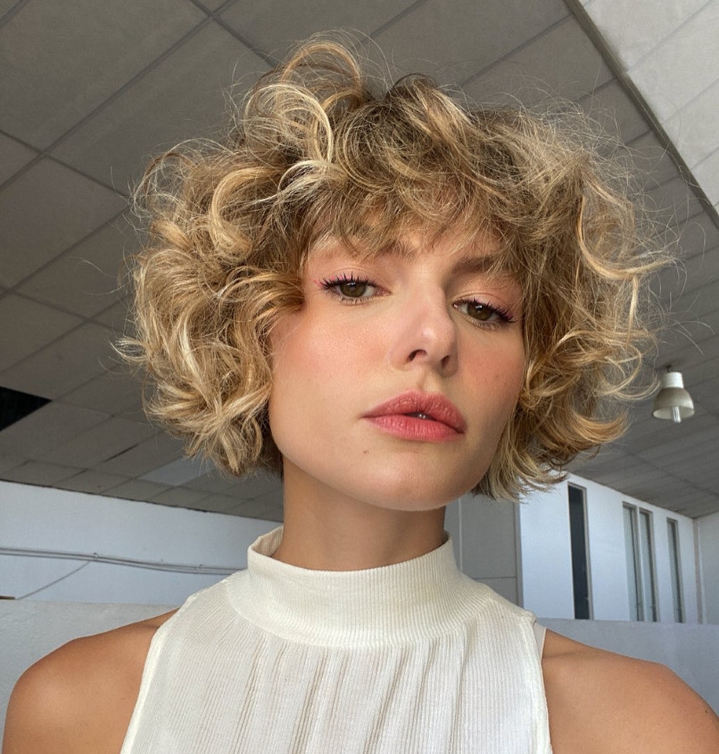 French bob with a full curly fringe