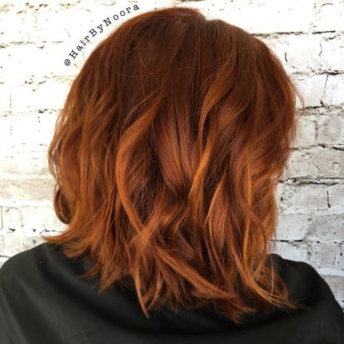 Tousled wavy copper bob