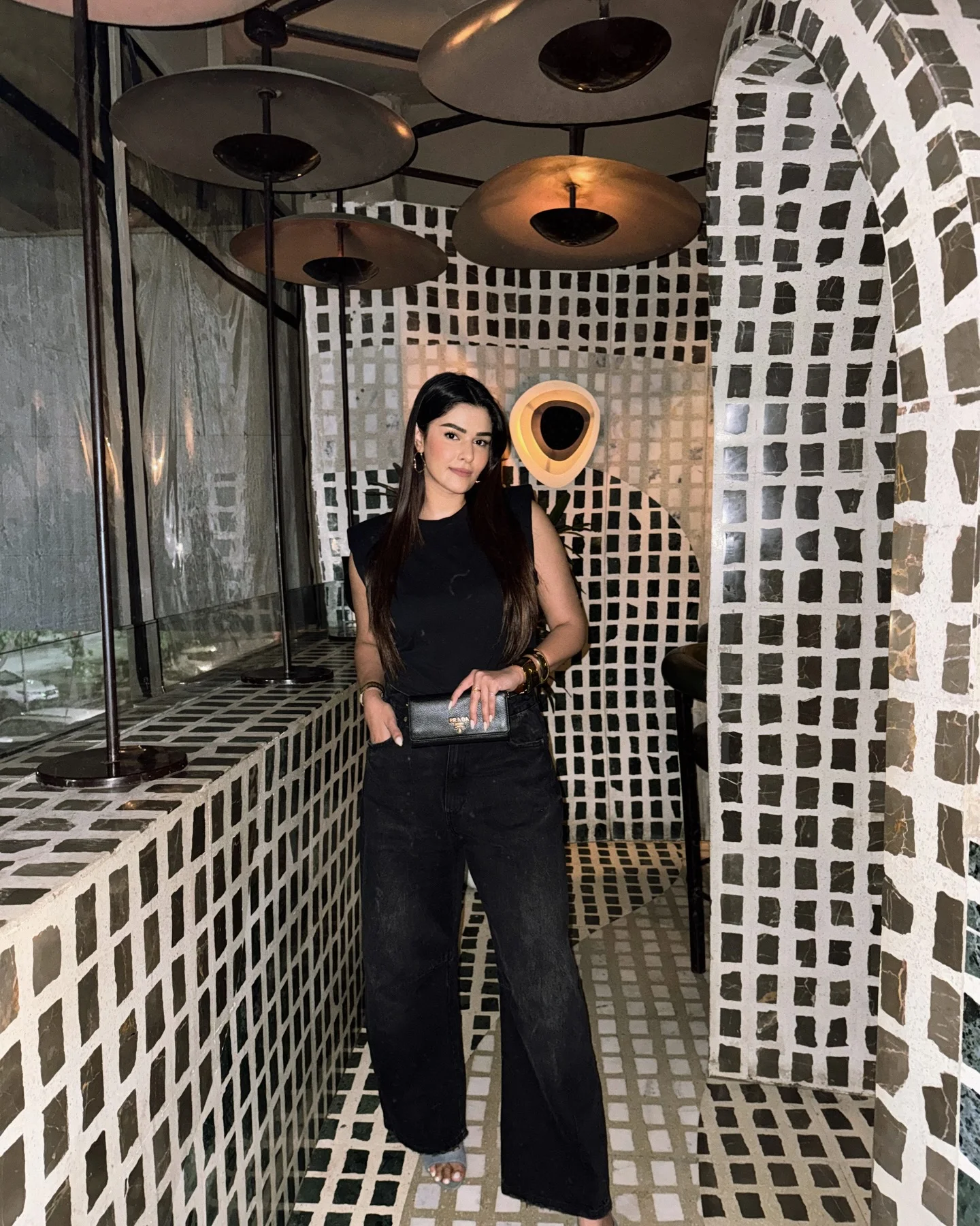 Fitted black tank with wide-leg denim cute dinner outfit