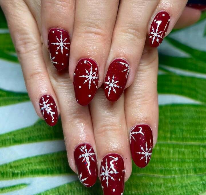 Deep Burgundy Snowflake Nails with Snowfall Dots snowflake nail art design