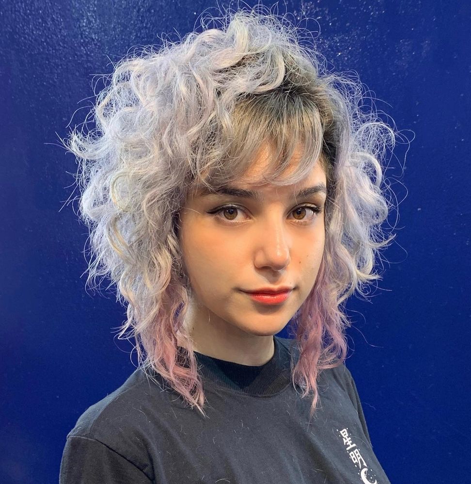 Shaggy curly bob with layered bangs