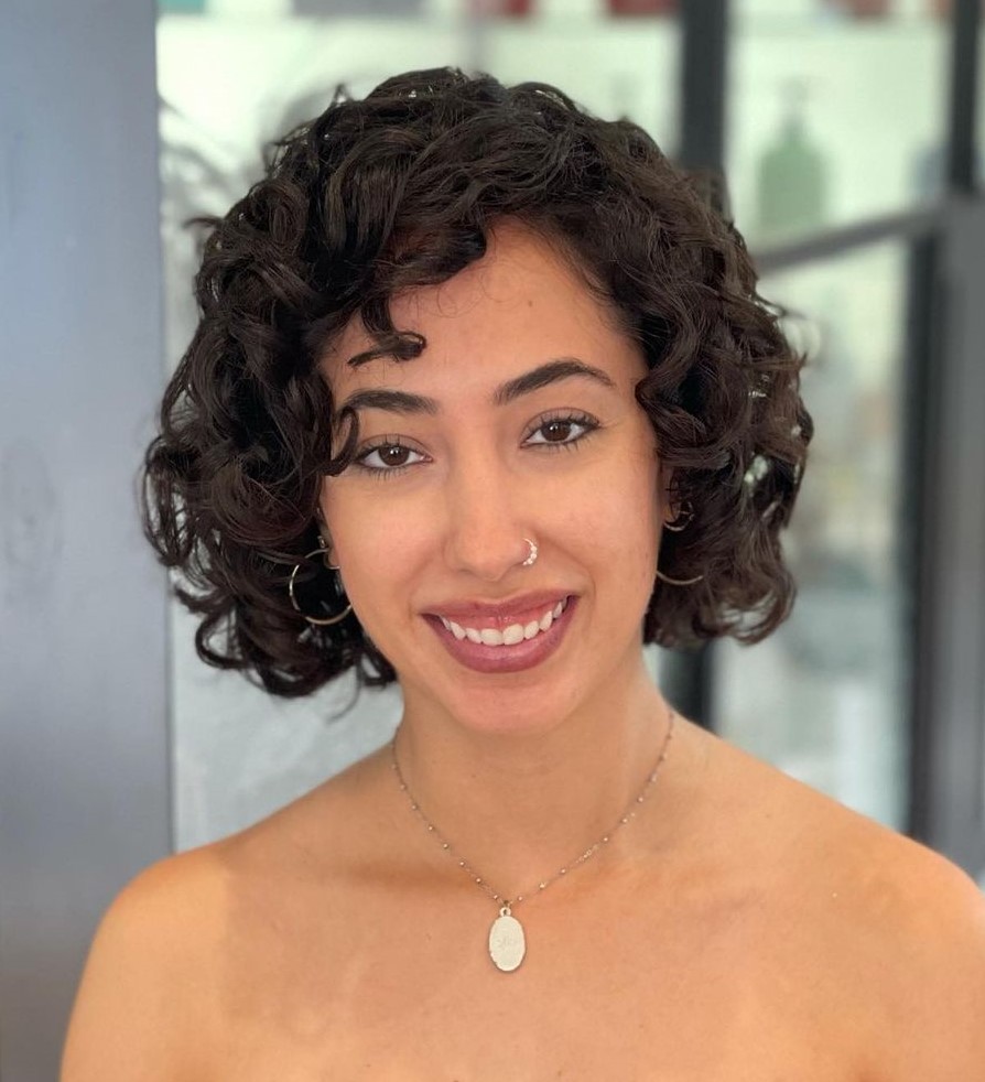 Curly chin length bob with a fringe