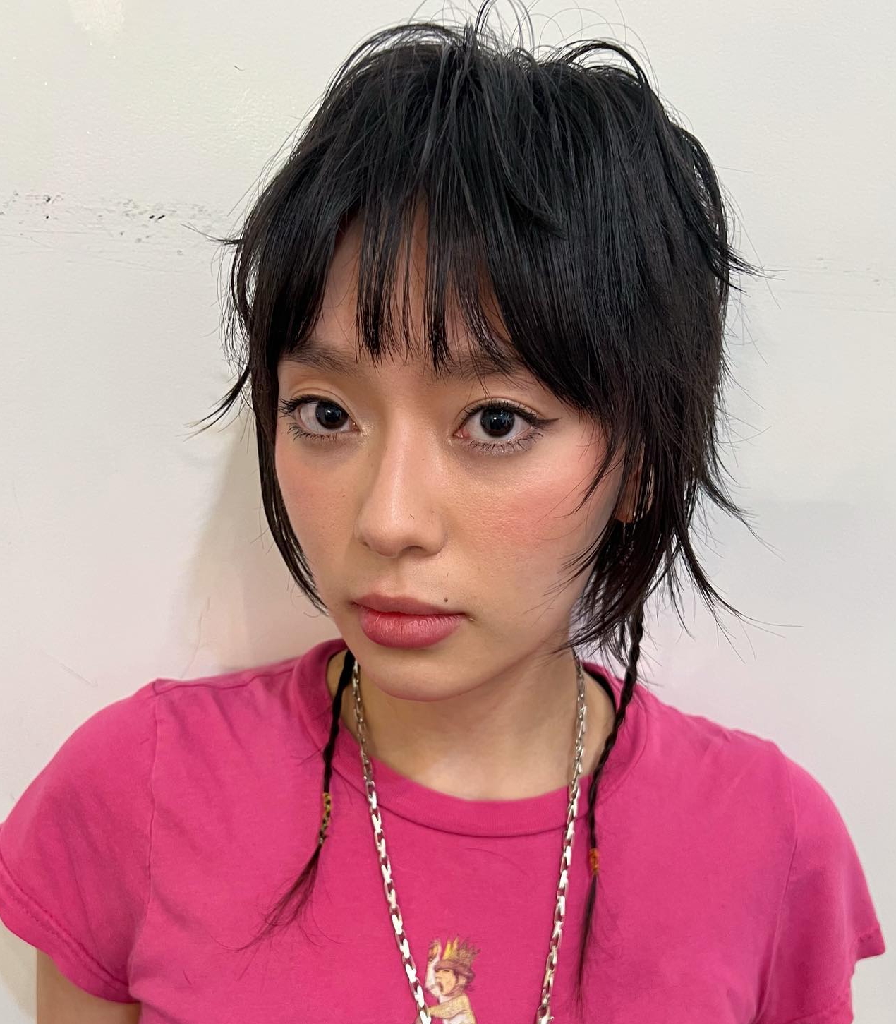 Korean-inspired wolf cut with deep fringe