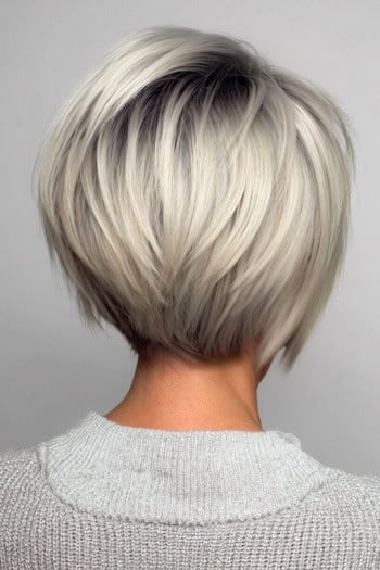 All-over platinum bixie with a stacked back blonde short hair