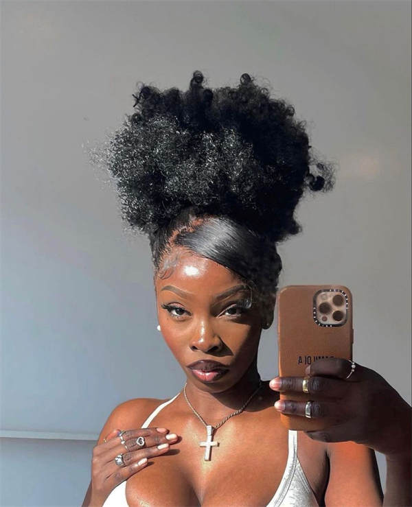 High Puff with a Swoop Bang 4c hair style