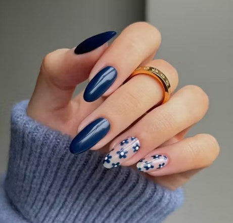 Navy Nails with Delicate Floral Accents blue winter nail design