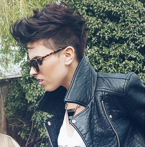 Choppy dark brown pixie with tapered sides textured pixie haircut