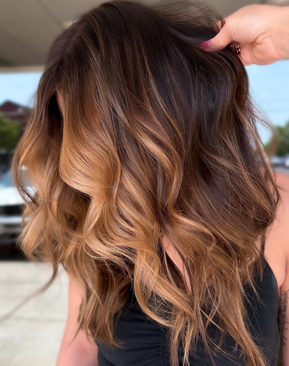 Face-framing caramel lights on a warm brunette base caramel brown hair
