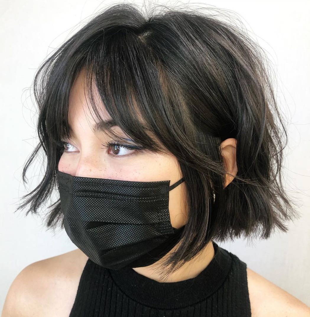 Tousled short cut with curtain bangs short hair hairstyle