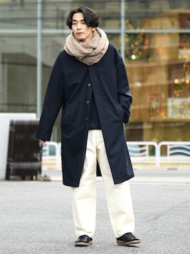 Navy Peacoat, Cream Scarf and Beige Trousers men's winter outfit