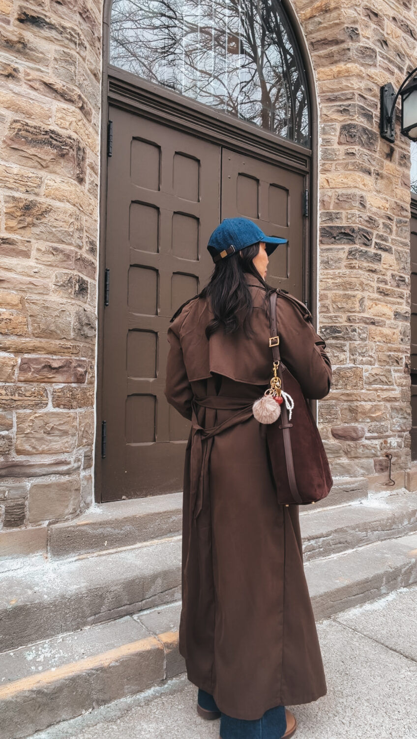 Long Brown Trench with a Cap and Suede Bag capsule wardrobe outfit