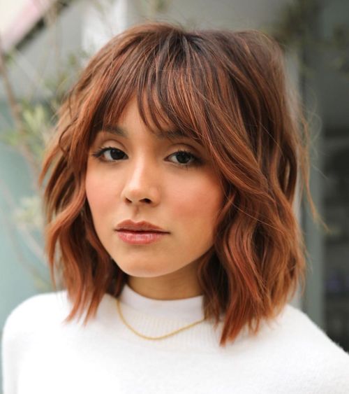 Collarbone shattered shag haircut with bangs and waves